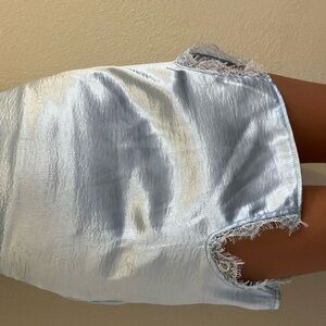 Shiny light blue skirt with lace slits size small